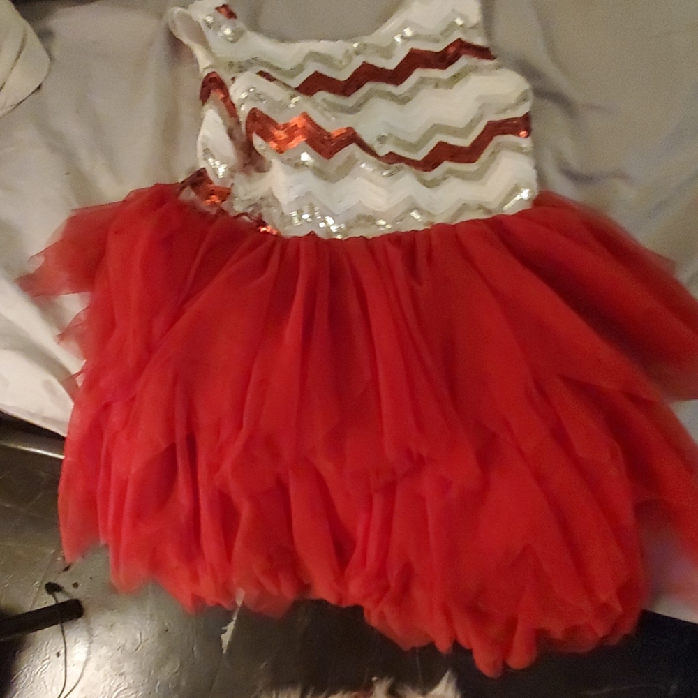 A little girl dress sparkles for a party or anythi